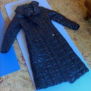 Long woman’s down jacket